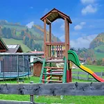 Dom wakacyjny Village With Garden *